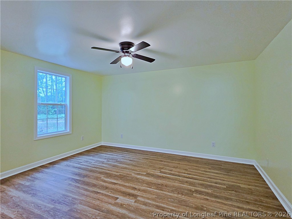 1031 Pine Acres Road White Oak, NC 28399 - Photo 14 of 29 wooden floor in an empty room