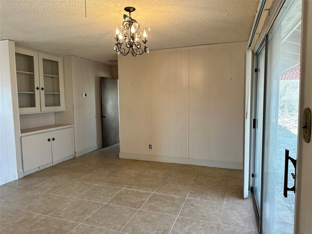 21418 Kathy Lane Spicewood, TX 78669 - Photo 12 of 40 a view of a chandelier in a room