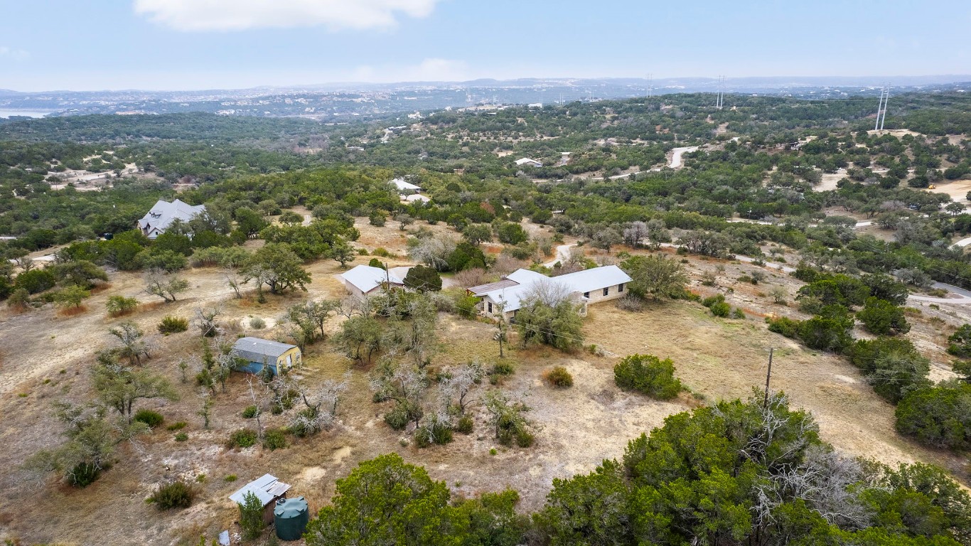 21418 Kathy Lane Spicewood, TX 78669 - Photo 23 of 40 an aerial view of residential houses with outdoor space