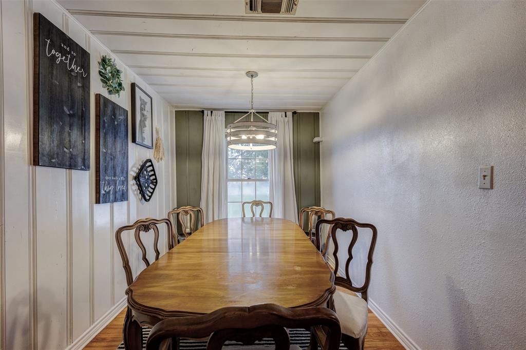 440 South Main Street Springtown, TX 76082 - Photo 12 of 33 a view of a dining room with furniture and window