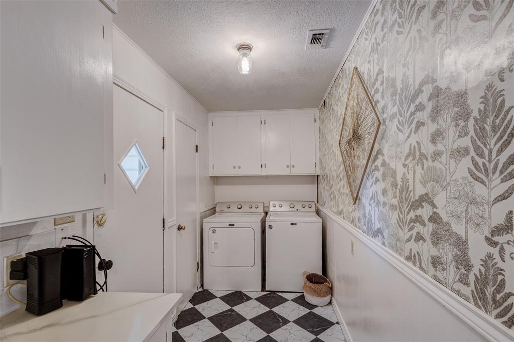 440 South Main Street Springtown, TX 76082 - Photo 15 of 33 a bathroom with a sink and a mirror