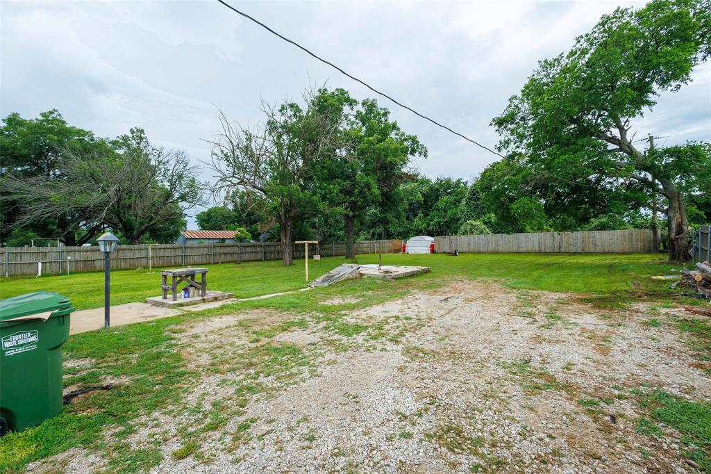 440 South Main Street Springtown, TX 76082 - Photo 22 of 33 a view of a park with swings