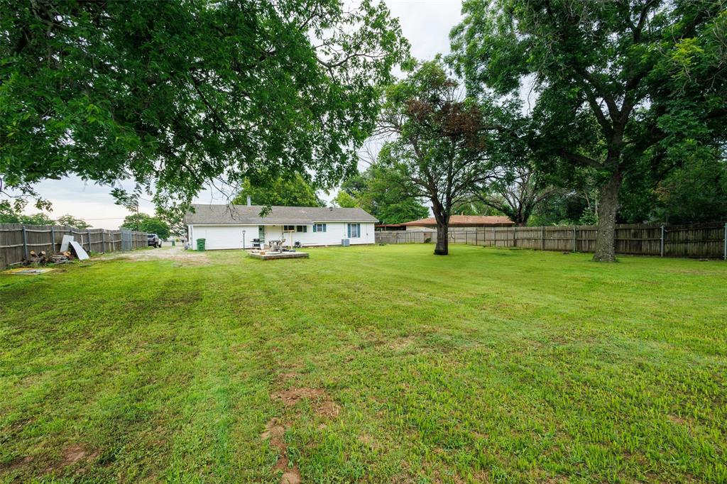 440 South Main Street Springtown, TX 76082 - Photo 25 of 33 a view of a park with large trees