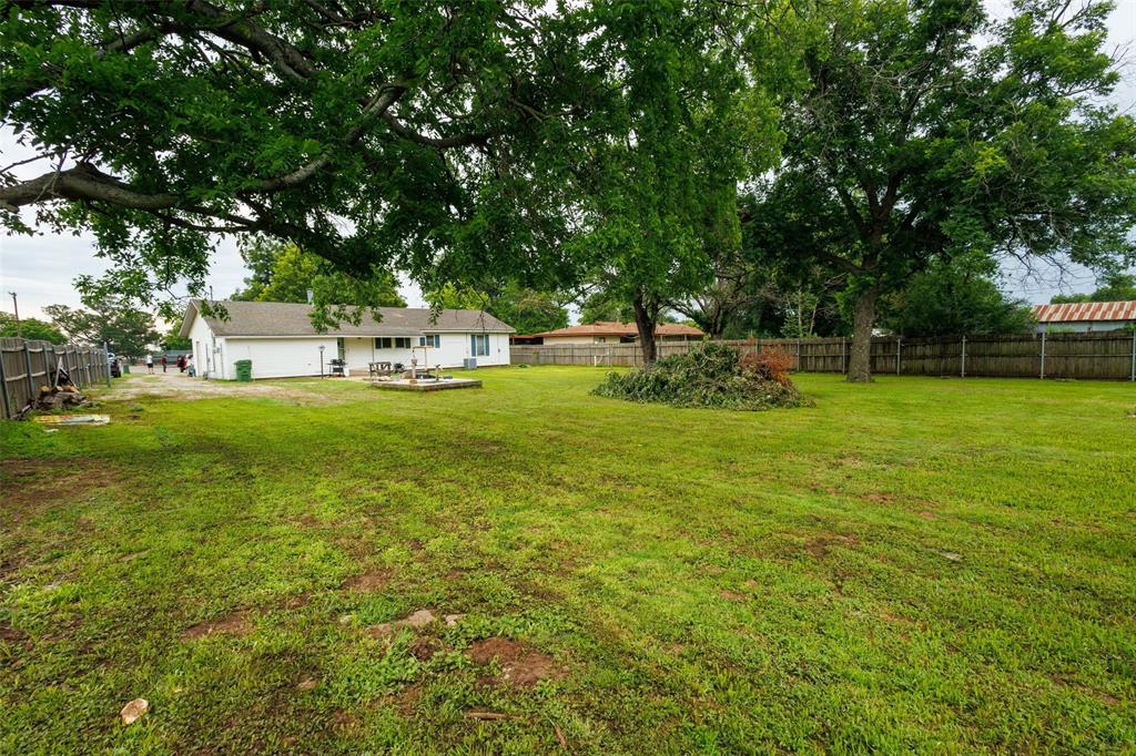440 South Main Street Springtown, TX 76082 - Photo 26 of 33 a view of a park with large trees