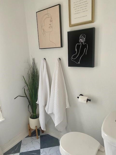 440 South Main Street Springtown, TX 76082 - Photo 29 of 33 a white toilet sitting next to a white house