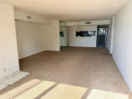a view of a livingroom with a flat screen tv