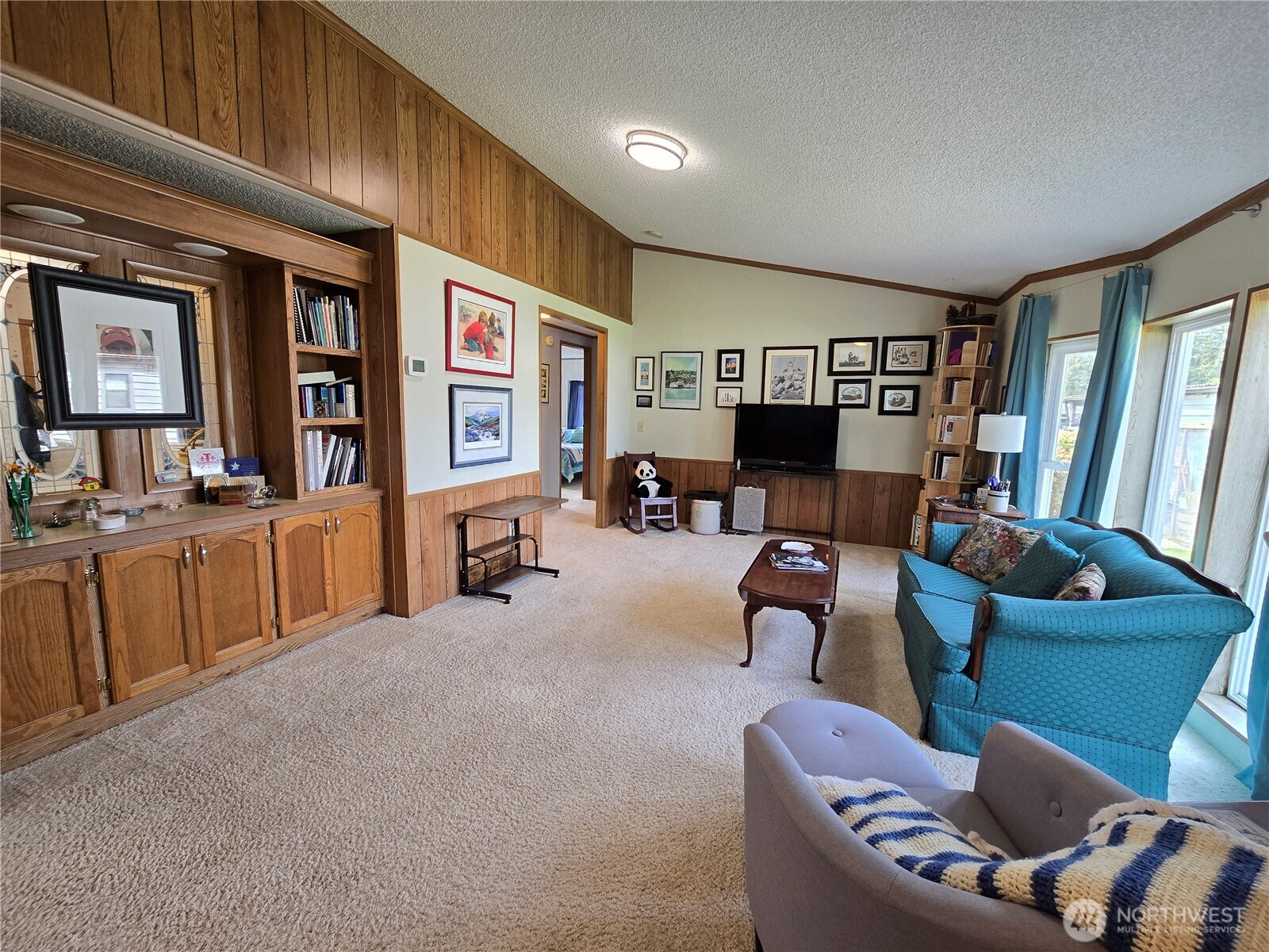 57 Clemons Road, Unit 12 Montesano, WA 98563 - Photo 15 of 30 a living room with furniture and large windows