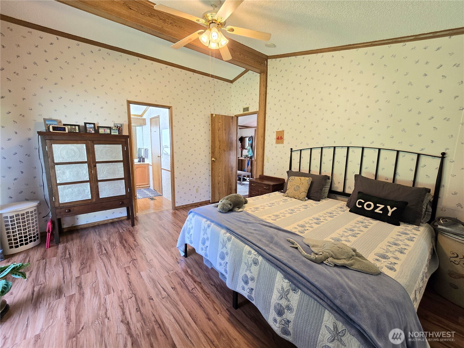 57 Clemons Road, Unit 12 Montesano, WA 98563 - Photo 17 of 30 a bed sitting in a bedroom next to a window