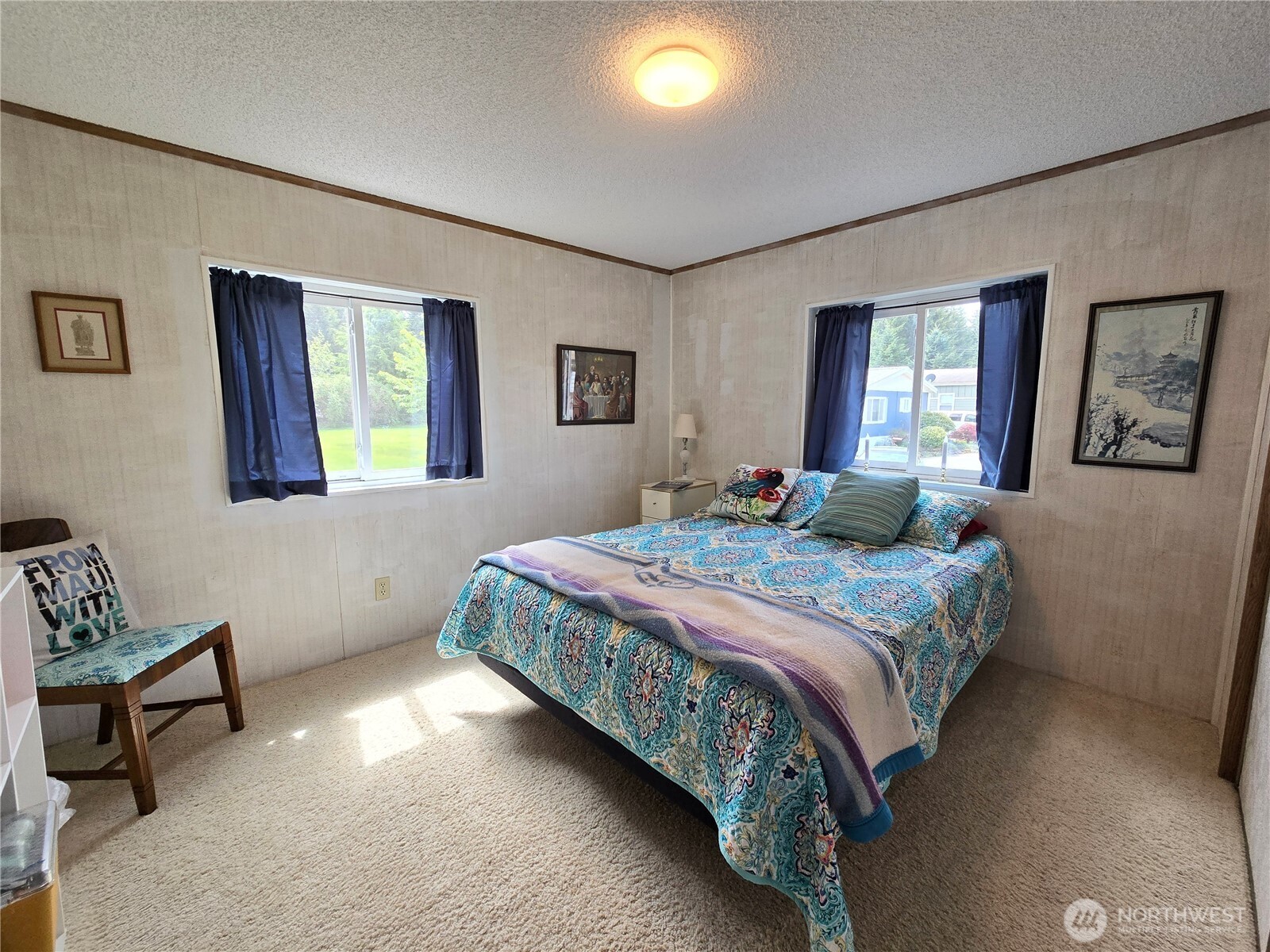 57 Clemons Road, Unit 12 Montesano, WA 98563 - Photo 21 of 30 a bedroom with a bed and window