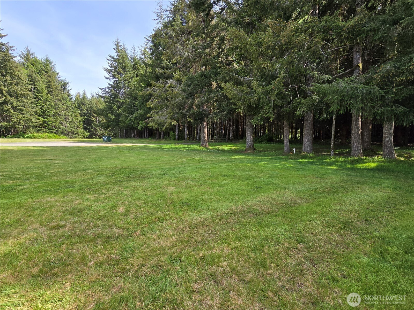 57 Clemons Road, Unit 12 Montesano, WA 98563 - Photo 30 of 30 a view of a grassy field with trees