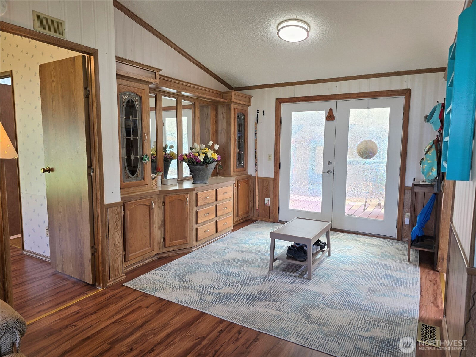 57 Clemons Road, Unit 12 Montesano, WA 98563 - Photo 6 of 30 a living room with furniture and a flat screen tv
