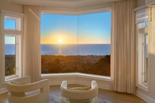 a view of a large window and a fire pit