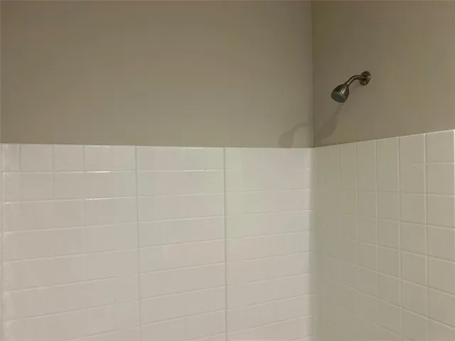 a view of a building with a garage