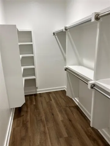 a view of an empty walk in closet