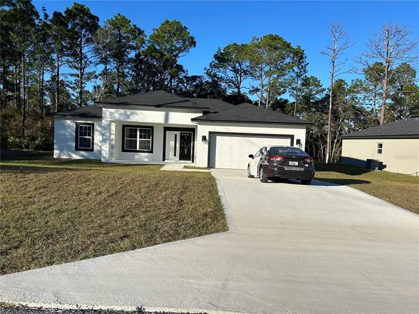 a view of a house with a patio
