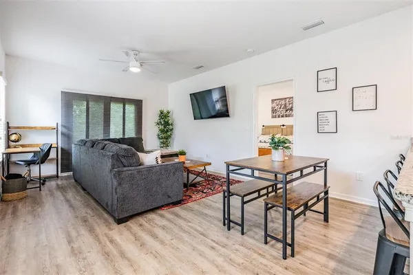 a living room with furniture and a table