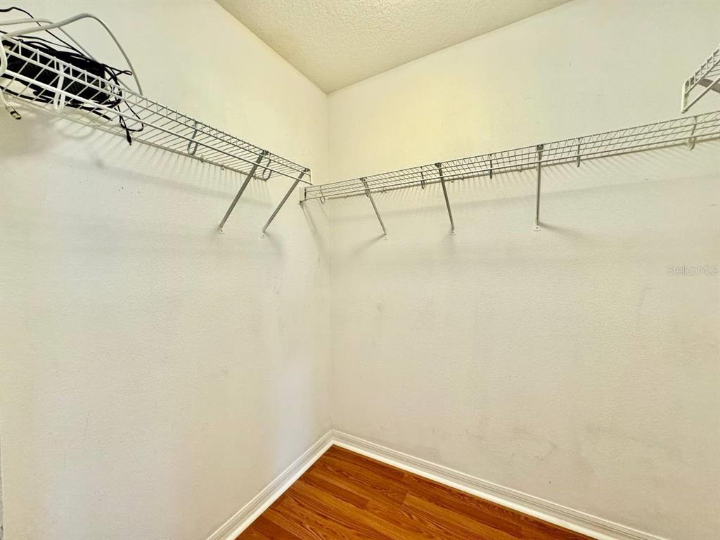 10545 Shady Falls Court Riverview, FL 33578 - Photo 27 of 36 a view of a room with racks on the wall