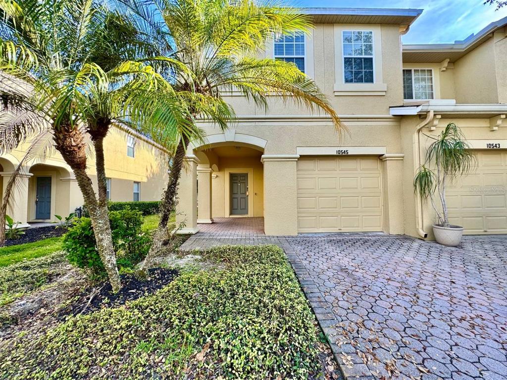 10545 Shady Falls Court Riverview, FL 33578 - Photo 3 of 36 a front view of a house with garden