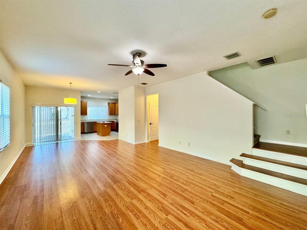 10545 Shady Falls Court Riverview, FL 33578 - Photo 4 of 36 a view of empty room with wooden floor and fan