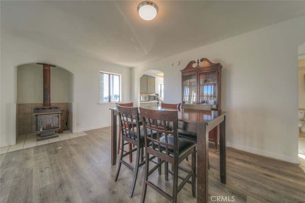 51201 Deer Mountain Way Anza, CA 92539 - Photo 17 of 65 a view of a dining room with furniture and wooden floor