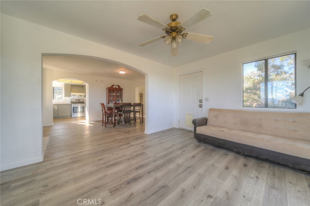 51201 Deer Mountain Way Anza, CA 92539 - Photo 26 of 65 a living room with furniture and a wooden floor