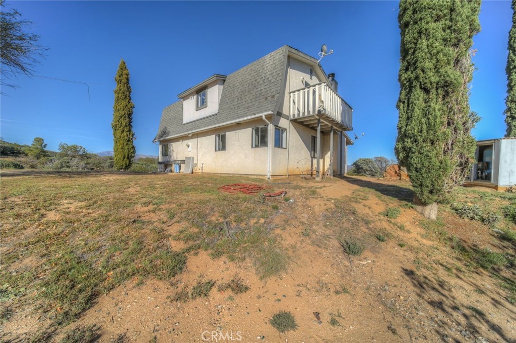 51201 Deer Mountain Way Anza, CA 92539 - Photo 4 of 65 a view of a house with a yard