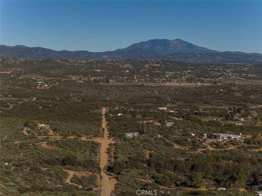 51201 Deer Mountain Way Anza, CA 92539 - Photo 60 of 65 a view of a mountain range in a cloudy sky