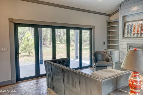 a living room with furniture and a window