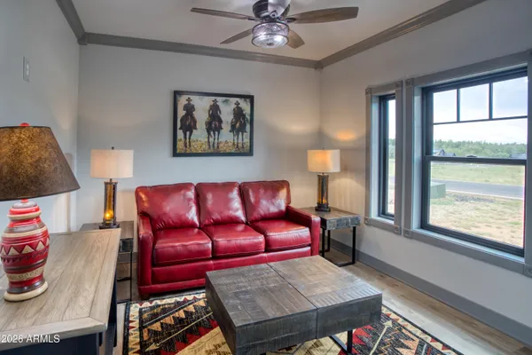 a living room with furniture and a window
