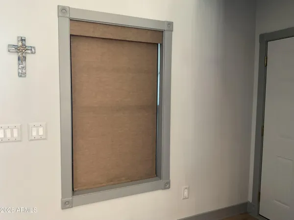 a bathroom with a glass door