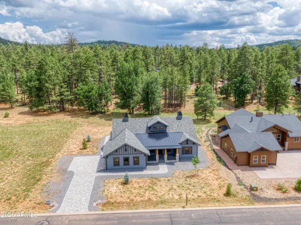 a view of a swimming pool with a yard