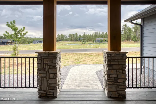 a house with trees in the background