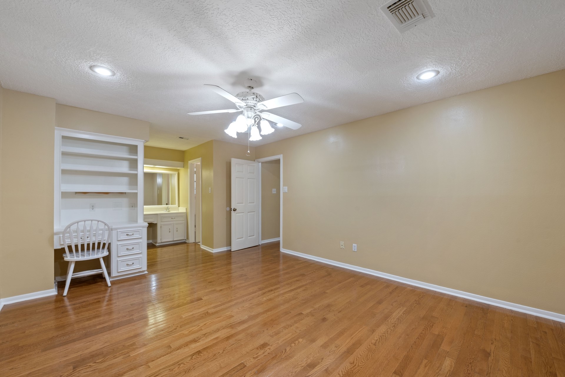 9719 Godstone Lane Spring, TX 77379 - Photo 13 of 19 Upstairs bedroom with built ins.