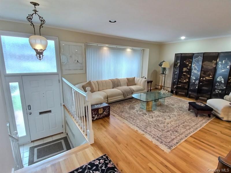 3421 Turf Road Oceanside, NY 11572 - Photo 10 of 50 a living room with furniture and wooden floor