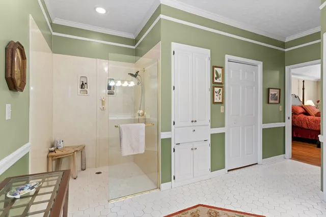 a view of a hallway with seating space