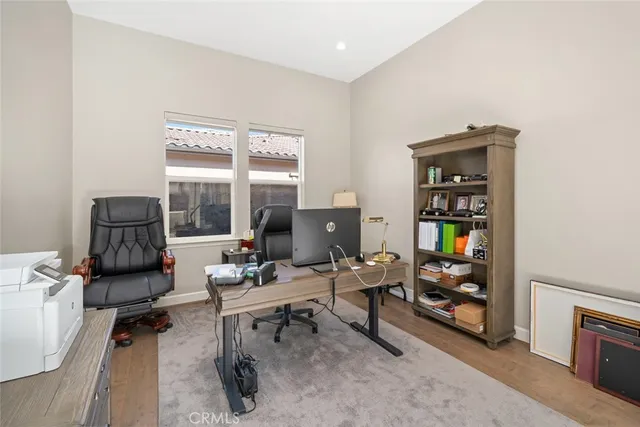 a view of a city with lots of residential buildings and mountain view in back