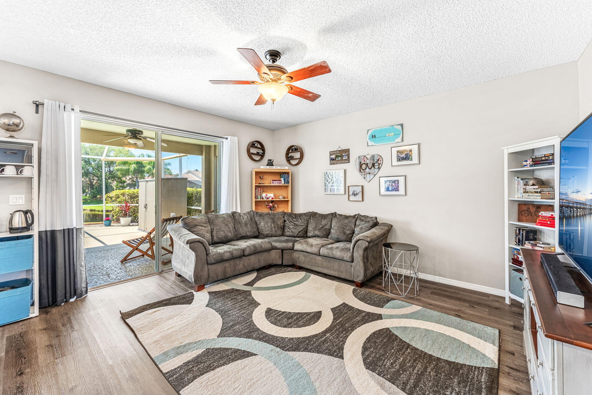 981 Shaw Circle Melbourne, FL 32940 - Photo 20 of 58 a living room with furniture and a large window