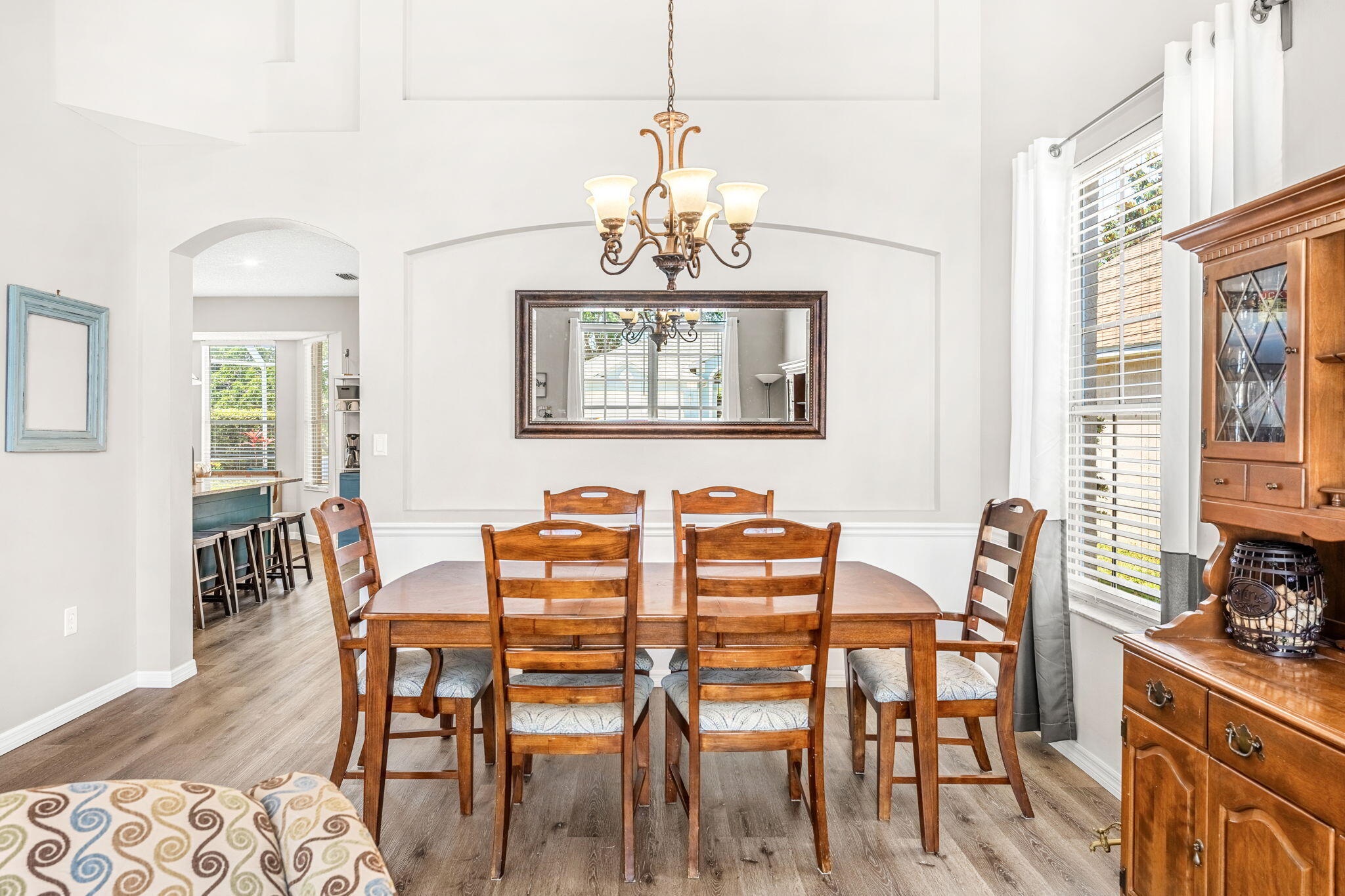 981 Shaw Circle Melbourne, FL 32940 - Photo 21 of 58 a dining room with furniture and window