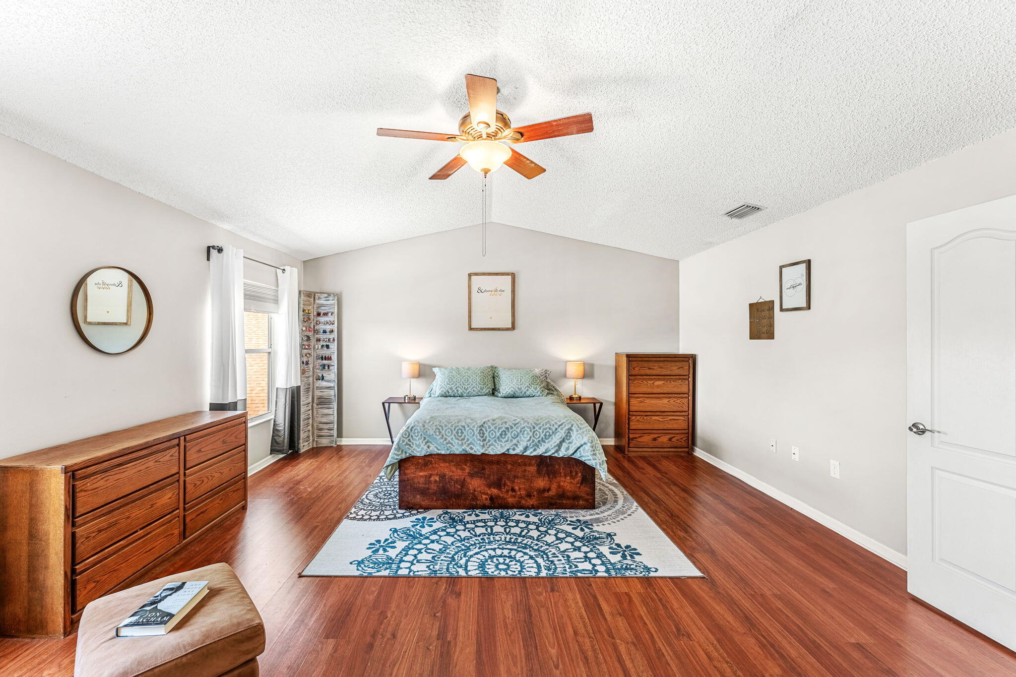 981 Shaw Circle Melbourne, FL 32940 - Photo 33 of 58 a living room with furniture and a rug