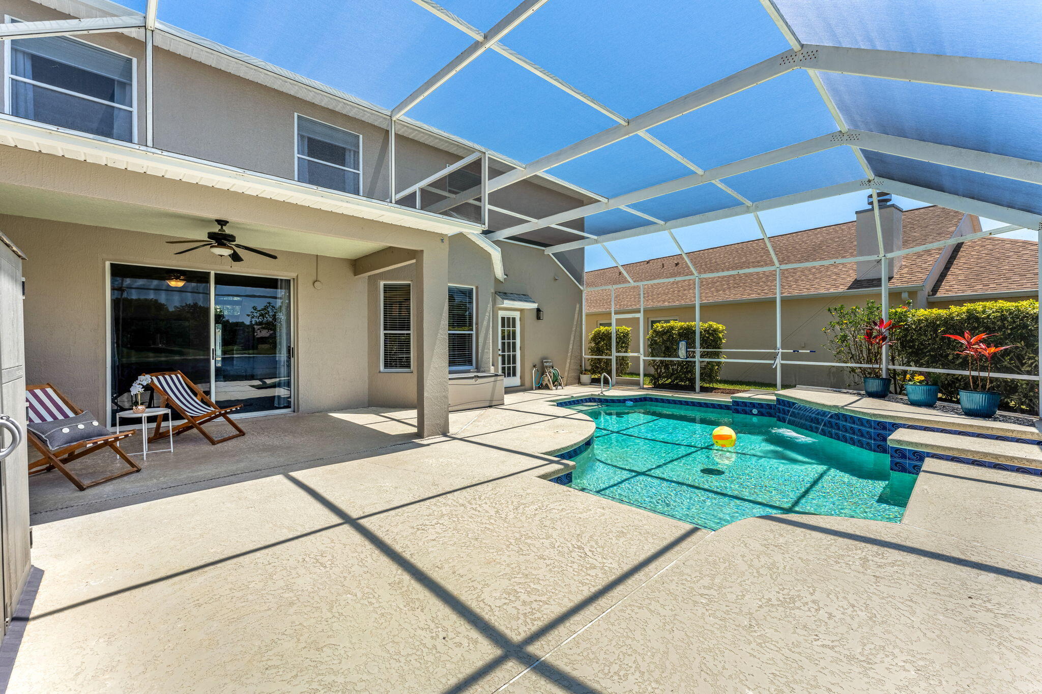 981 Shaw Circle Melbourne, FL 32940 - Photo 42 of 58 a view of a backyard with a patio and a garden