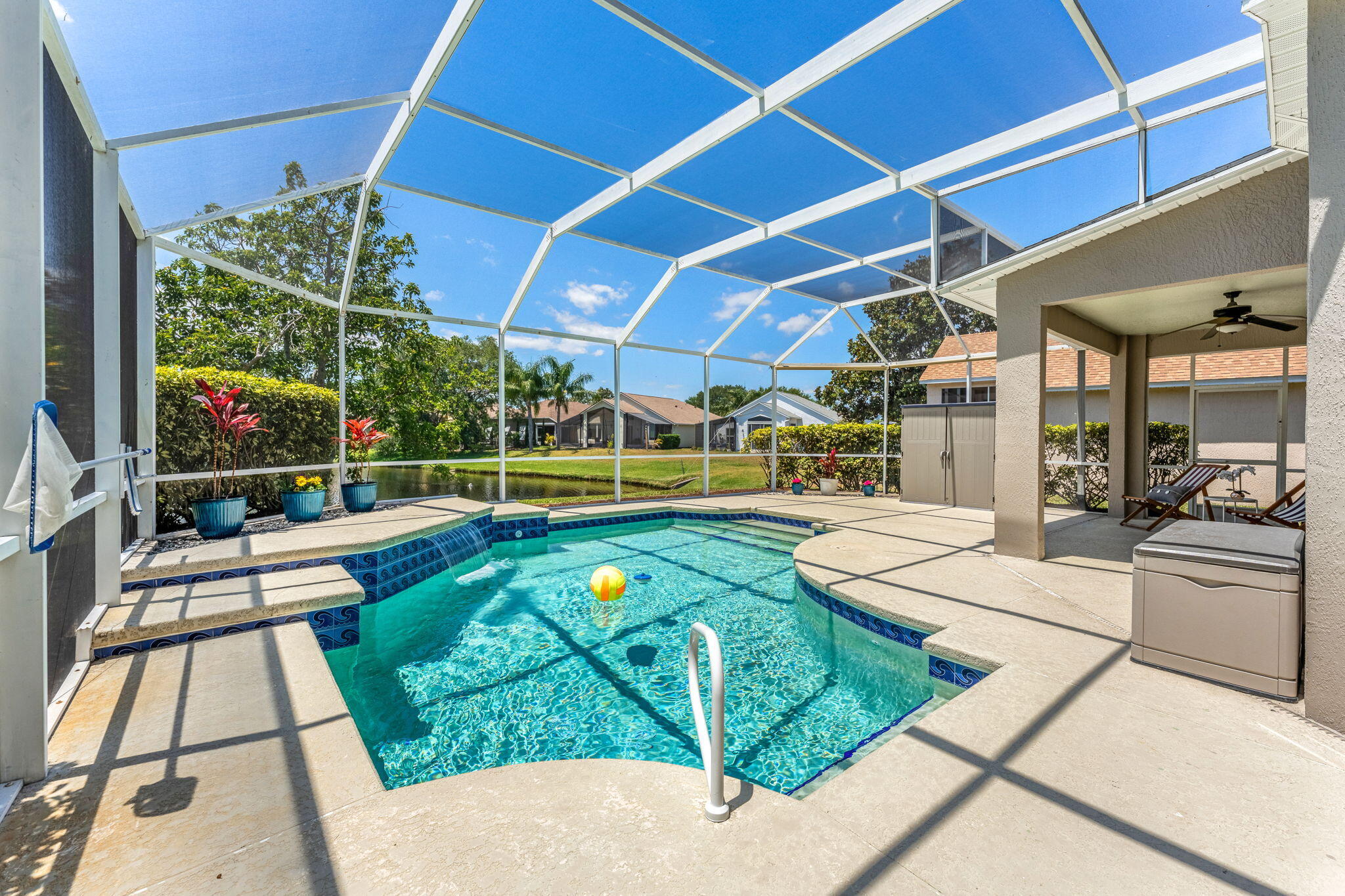 981 Shaw Circle Melbourne, FL 32940 - Photo 43 of 58 a view of a swimming pool with a porch