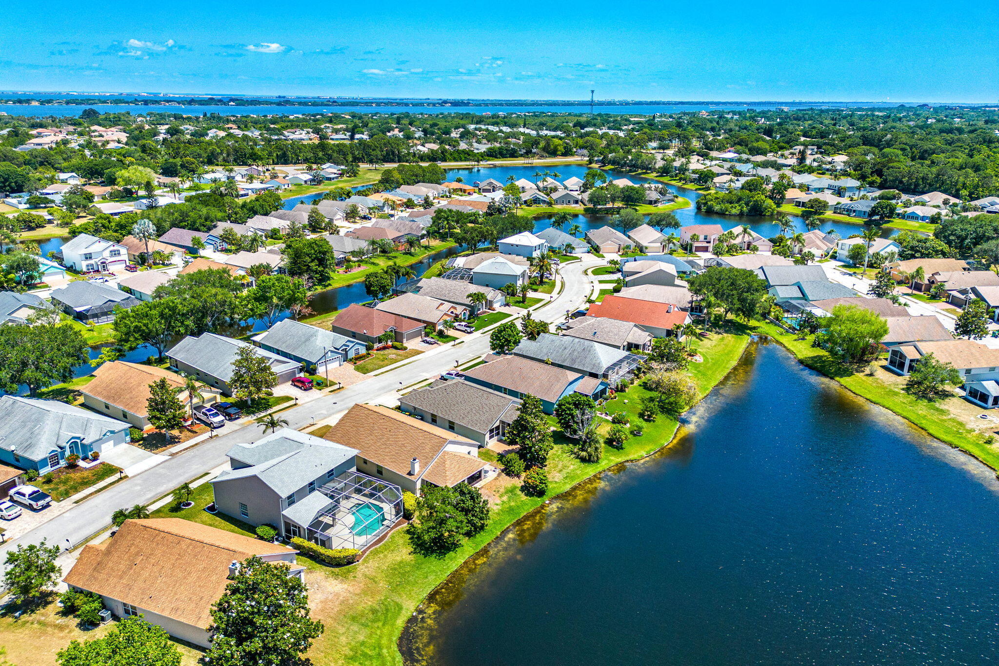 981 Shaw Circle Melbourne, FL 32940 - Photo 49 of 58 an aerial view of residential houses with outdoor space