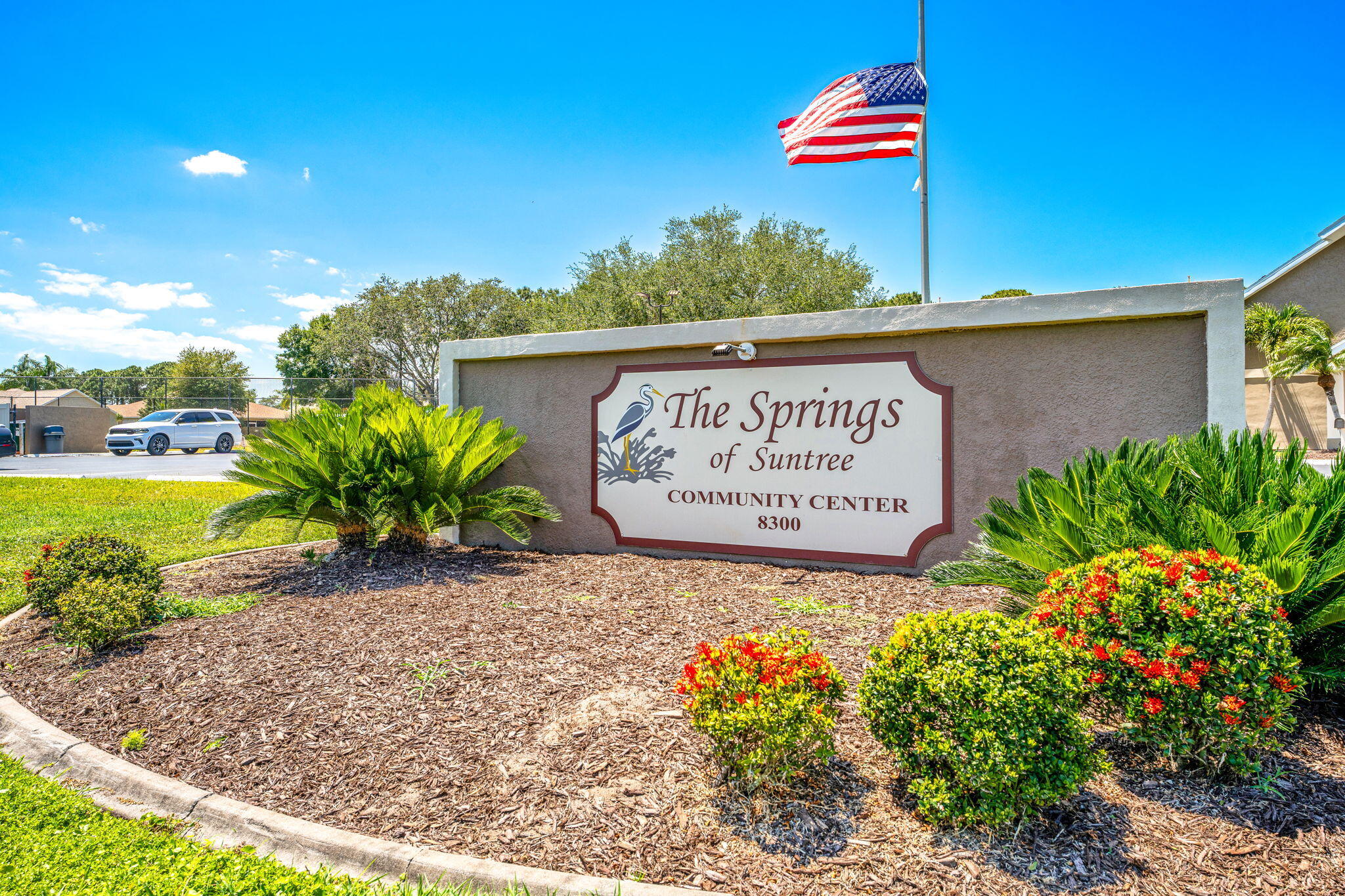 981 Shaw Circle Melbourne, FL 32940 - Photo 50 of 58 a sign that is sitting in front of flowers