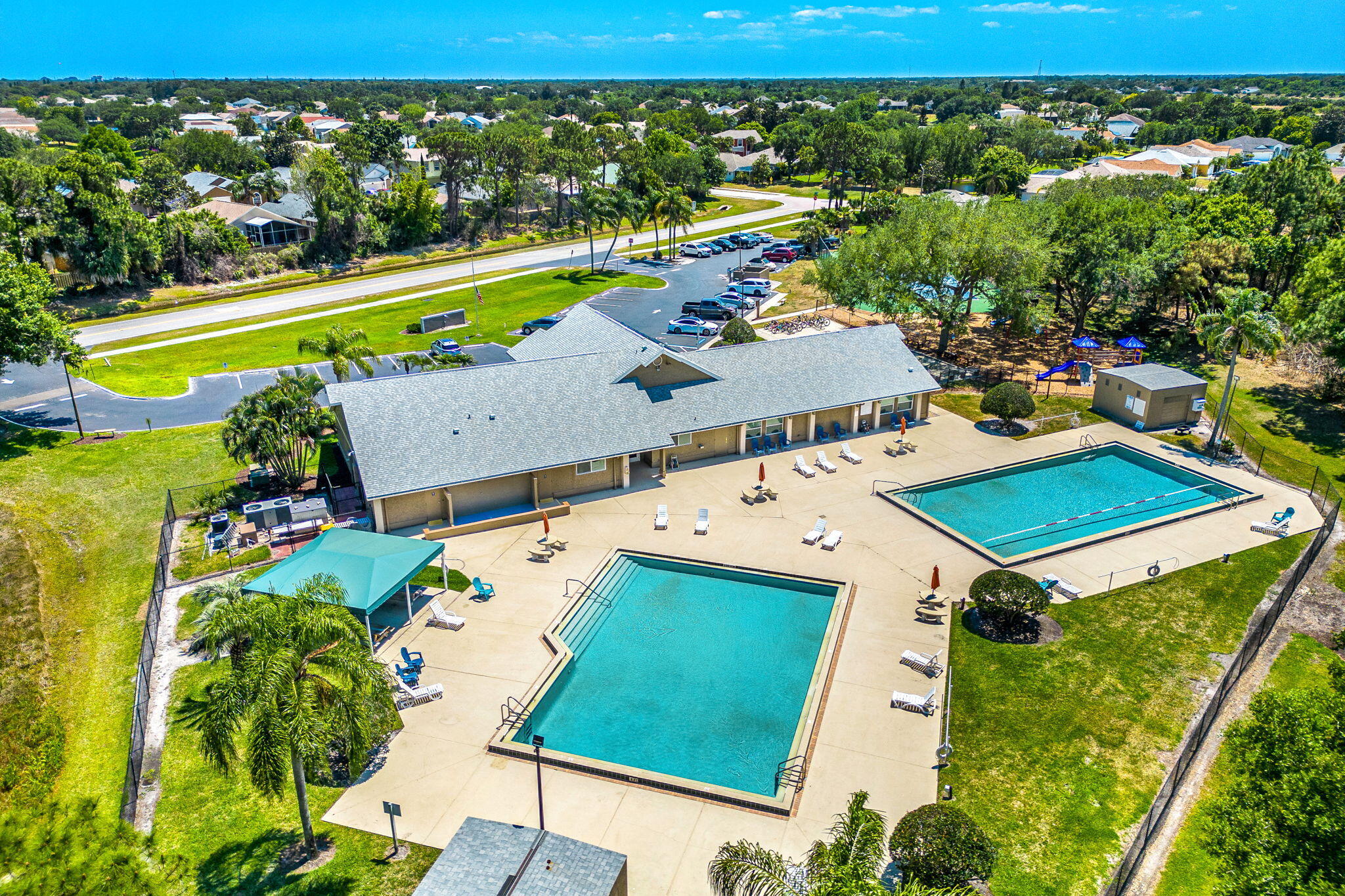 981 Shaw Circle Melbourne, FL 32940 - Photo 53 of 58 an aerial view of a house with a swimming pool