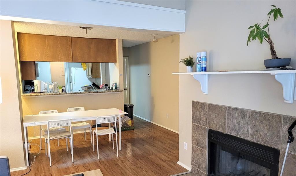 806 West 24th Street, Unit 233 Austin, TX 78705 - Photo 3 of 5 a dining room with furniture and wooden floor