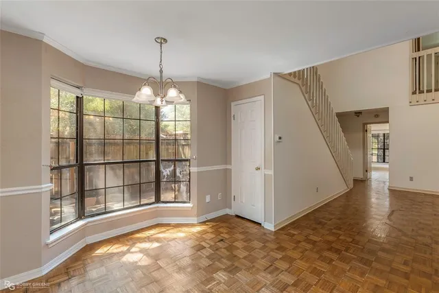 a view of a room with a large windows