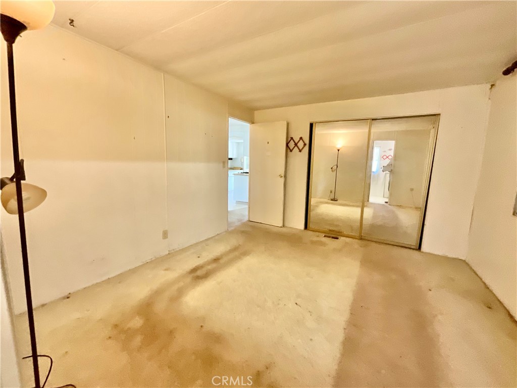 7282 Marin Street Nice, CA 95464 - Photo 51 of 69 a view of an empty room with wooden floor