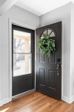 a view of entryway with wooden floor