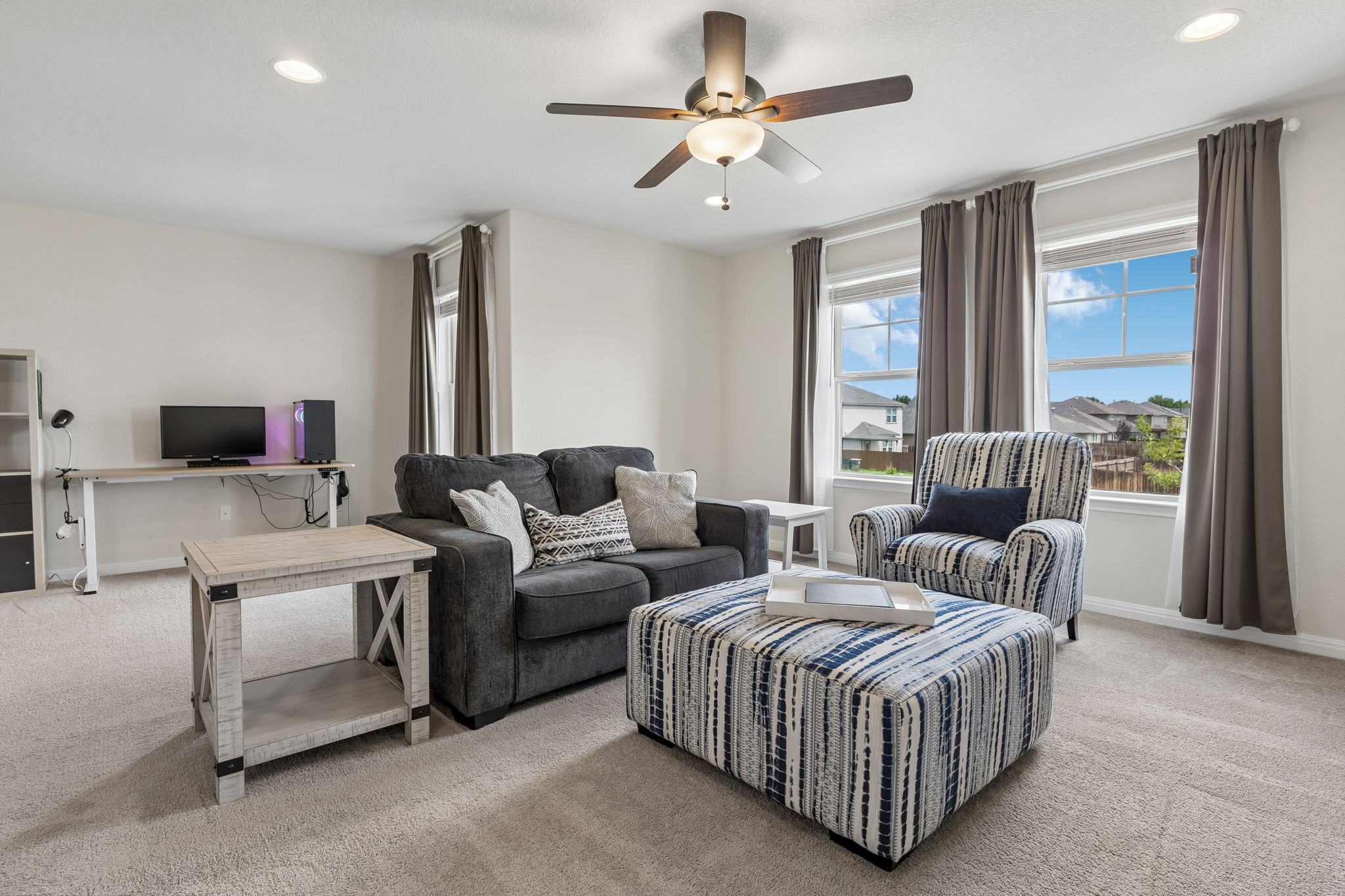 809 Whitman Avenue Georgetown, TX 78626 - Photo 20 of 35 a living room with furniture ceiling fan and a window