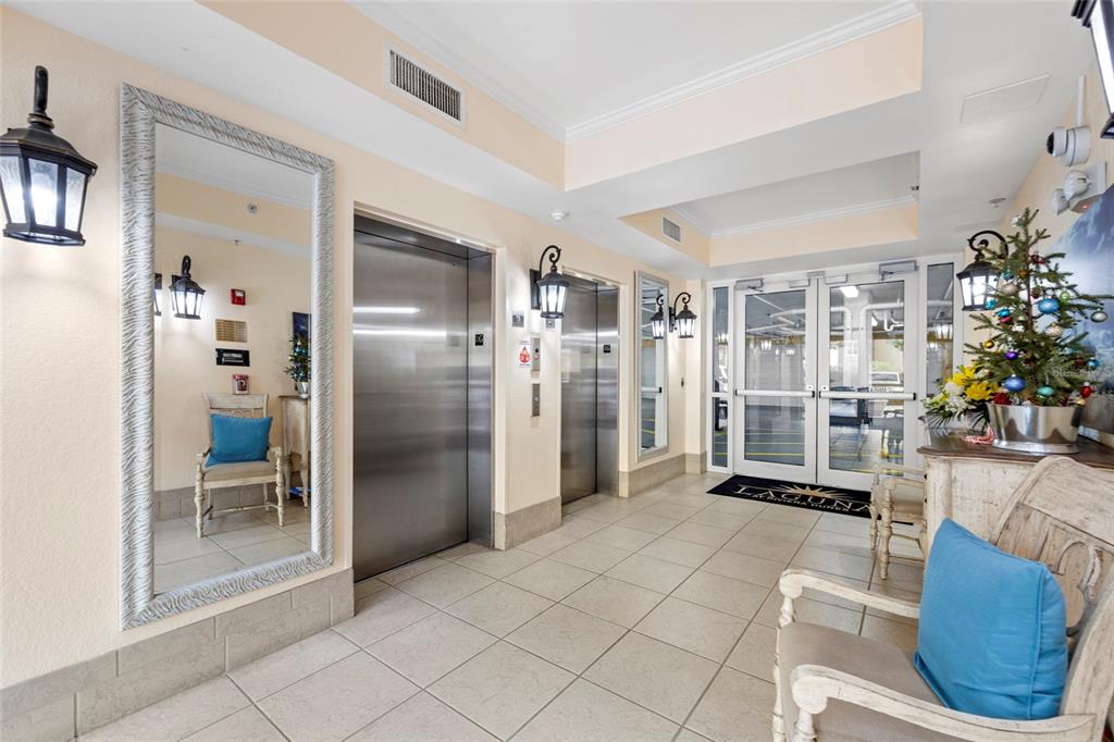 615 Riviera Dunes Way, Unit 204 Palmetto, FL 34221 - Photo 34 of 43 a living room with furniture